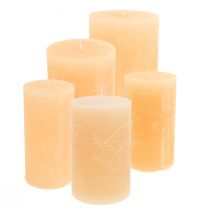 Bougies de couleur unie lumière abricot Différentes tailles