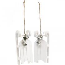 Article Duo de mini traîneaux décoratifs en bois blanc avec grelots et cordelette 13 cm
