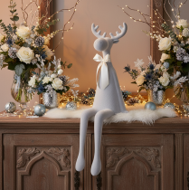 Article Figurine décorative renne floconnée avec nœud 80 cm gris clair