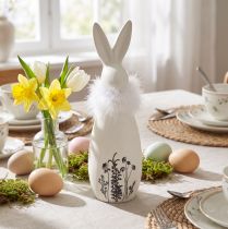 Article Figurine décorative lapin en céramique blanche avec motifs floraux et plumes H20,5 cm