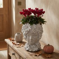 Article Buste décorative en pierre moulée femme avec fleurs 21,5 cm