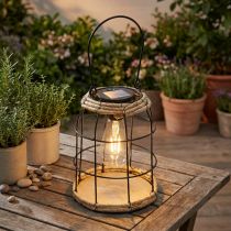 Article Lanterne solaire de jardin en métal noir avec accents naturels, Ø 17 cm
