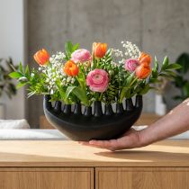 Article Vase en céramique noir mat en forme de bateau avec ouvertures - Hauteur 15 cm