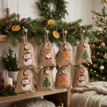 Article Lot de 8 petits sacs cadeau Noël en jute 10×13 cm avec motifs festifs