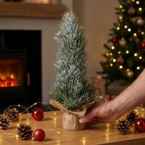Article Mini sapin de Noël artificiel enneigé dans un sac en jute H41cm