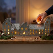 Article Décoration en métal pour bougies, village de maisons argenté, L52xH20cm