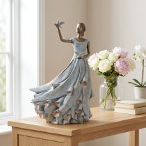 Article Figurine décorative femme et oiseau en robe blanche effet cuivré, 41 cm