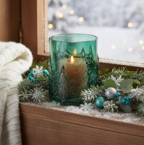 Article Photophore en verre turquoise avec motif de sapins en relief 16 cm