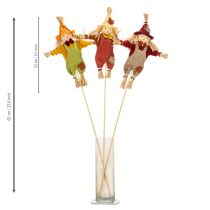 Article Figurine décorative épouvantail sur bâton en tissu et paille 60 cm