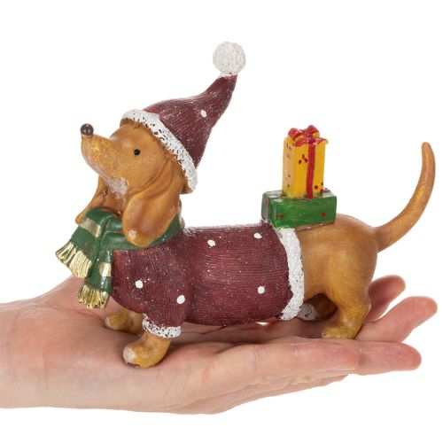 Figurine décorative teckel en polyresine avec manteau, bonnet et cadeau 18 cm | Floristik24.fr