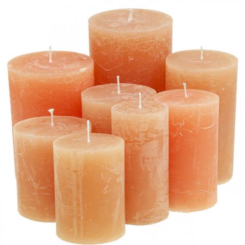 Floristik24 Bougies de couleur unie Orange Pêche Différentes tailles