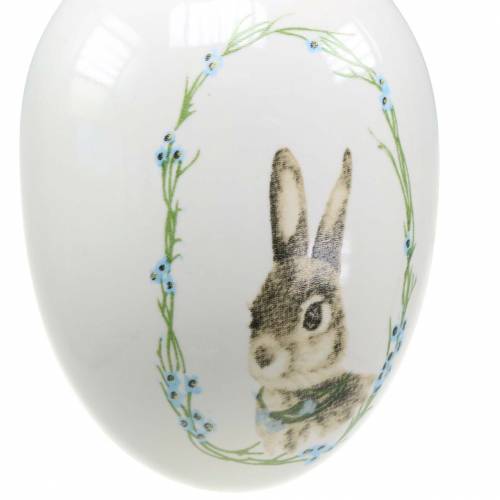 Floristik24 Oeuf à suspendre lapin blanc en céramique Ø5,5cm H7,6cm 12pcs