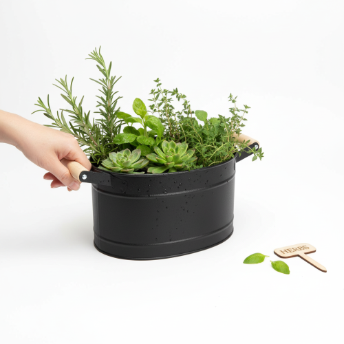 Article Pot de fleurs ovale en métal avec anse, finition noire et naturelle, 34 x 19,5 x 15 cm