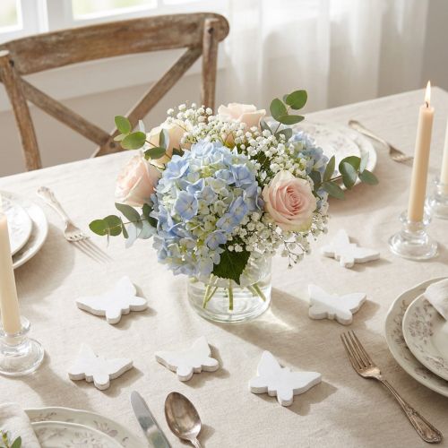 Papillons décoratifs en bois blanc 2,8 cm - 3,3 cm (lot de 28) | Floristik24.fr