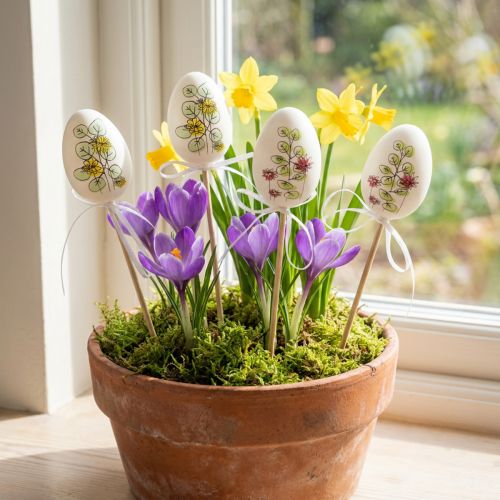 Oeufs décoratifs en plastique avec motifs floraux sur tige H6cm - Lot de 12 | Floristik24.fr