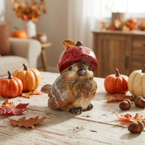 Figurine décorative oiseau en céramique avec bonnet rouge en forme de pomme 13 cm | Floristik24.fr