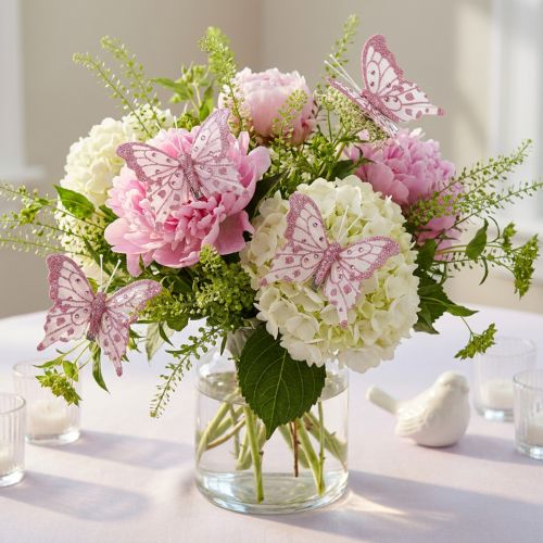 Lot de 4 papillons décoratifs en plumes roses avec paillettes 7,5x7cm | Floristik24.fr
