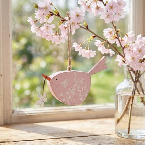 Décoration suspendue oiseau en bois rose avec fleur – 15×8,5 cm | Floristik24.fr