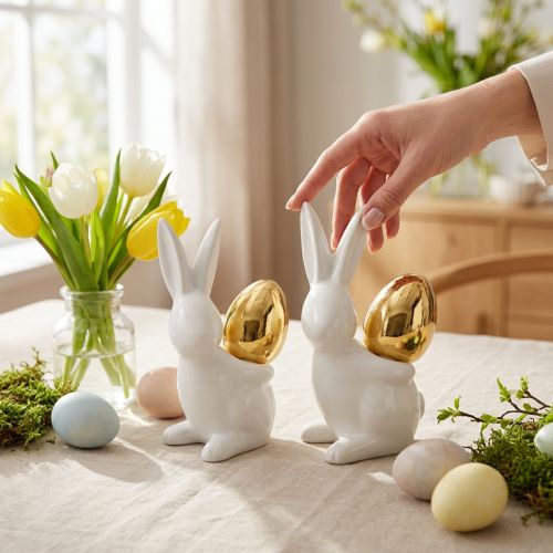 Figurines lapin en céramique avec œufs dorés – Lot de 2, H13 cm, blanc et or | Floristik24.fr