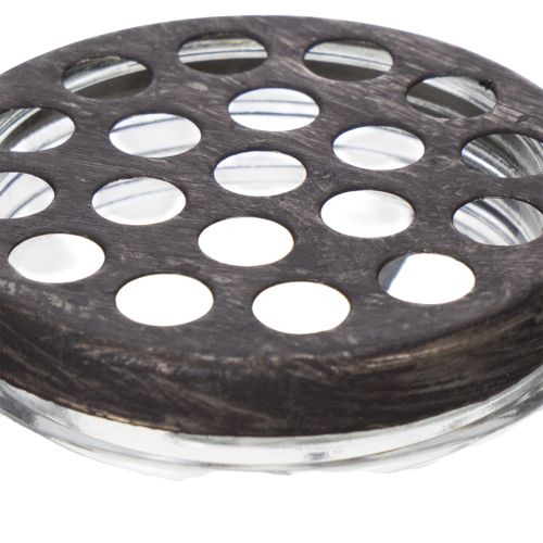 Article Bouteille en verre dans un panier en métal, idéale pour apporter une touche décorative au salon, 20 cm