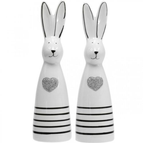 Floristik24 Lapin en céramique noir et blanc, décoration lapin de Pâques paire de lapins avec coeur H20,5cm 2pcs