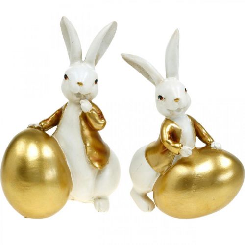 Floristik24 Lapin de Pâques blanc-doré, décoration de Pâques, lapin déco avec oeuf H16/18cm lot de 2