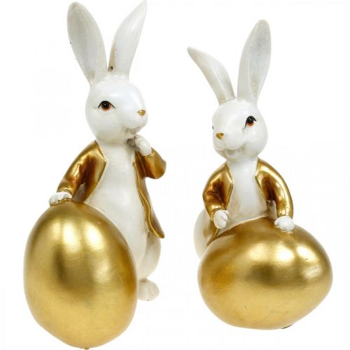 Floristik24 Lapin de Pâques blanc-doré, décoration de Pâques, lapin déco avec oeuf H16/18cm lot de 2