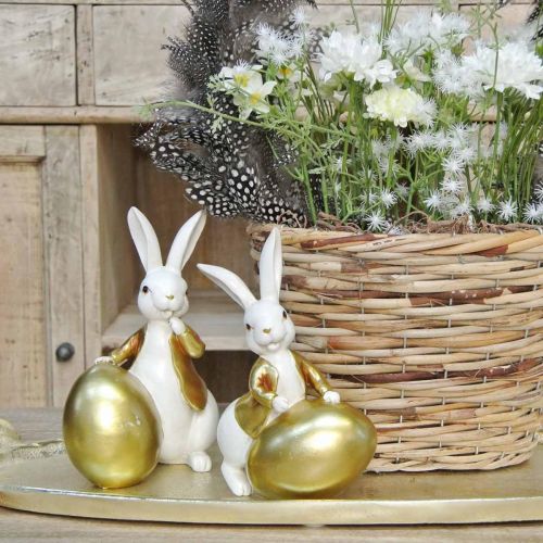 Floristik24 Lapin de Pâques blanc-doré, décoration de Pâques, lapin déco avec oeuf H16/18cm lot de 2