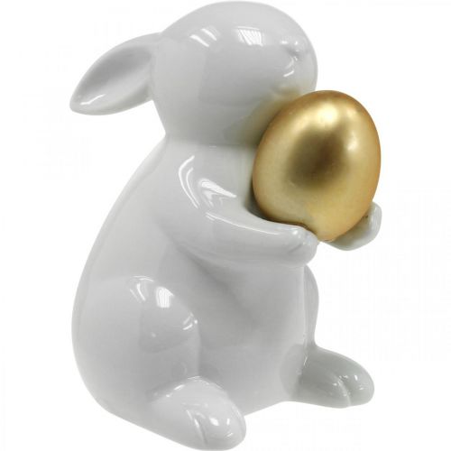 Article Lapin avec oeuf doré en céramique, décoration de Pâques blanc élégant, doré H15cm