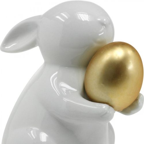 Article Lapin avec oeuf doré en céramique, décoration de Pâques blanc élégant, doré H15cm