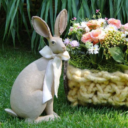 Floristik24 Lapin de Pâques assis avec noeud polyrésine décoration de table Pâques H30cm