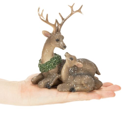 Figurine décorative famille de cerfs avec neige en plastique 17 cm | Floristik24.fr
