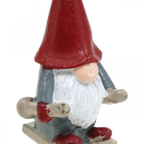 Floristik24 Bougie motif Lutin de Noël, décoration de l&#39;avent, lutin aux skis, bougie décorative H12cm