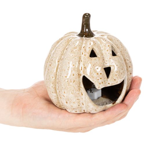 Citrouille décorative en céramique avec LED et visage souriant 13 cm | Floristik24.fr