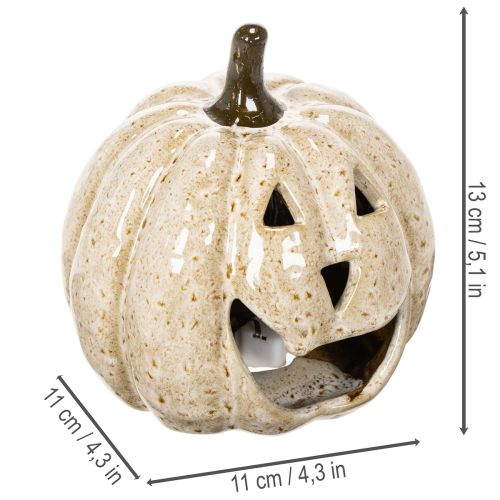 Citrouille décorative en céramique avec LED et visage souriant 13 cm | Floristik24.fr