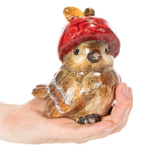 Décoration en céramique oiseau avec bonnet pomme rouge 13cm | Floristik24.fr