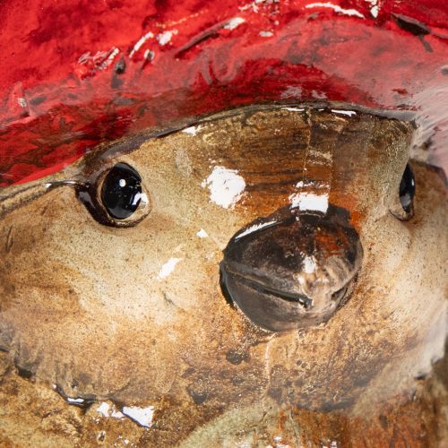 Décoration en céramique oiseau avec bonnet pomme rouge 13cm | Floristik24.fr