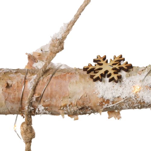 Article Décoration murale de Noël avec guirlande lumineuse micro LED, petits flocons de neige en bois et branches enneigées H150cm