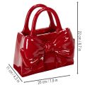 Vase décoratif en forme de sac à main avec nœud, finition brillante, 22 cm | Floristik24.fr