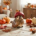 Figurine décorative oiseau en céramique avec bonnet rouge en forme de pomme 13 cm | Floristik24.fr