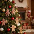 Bonhomme en pain d'épices décoratif à suspendre en fibre de bois assortie 8 cm 12 pièces | Floristik24.fr
