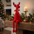 Déofigurine élan rouge avec nœud assise, 54 cm, plastique floqué, intérieur | Floristik24.fr