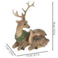 Figurine décorative famille de cerfs avec neige en plastique 17 cm | Floristik24.fr