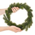 Couronne décorative artificielle en sapin vert 35 cm pour porte | Floristik24.fr