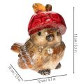 Décoration en céramique oiseau avec bonnet pomme rouge 13cm | Floristik24.fr